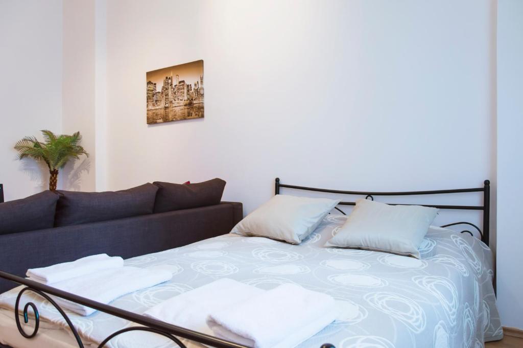Posteľ alebo postele v izbe v ubytovaní Modern Apartments Opatovická