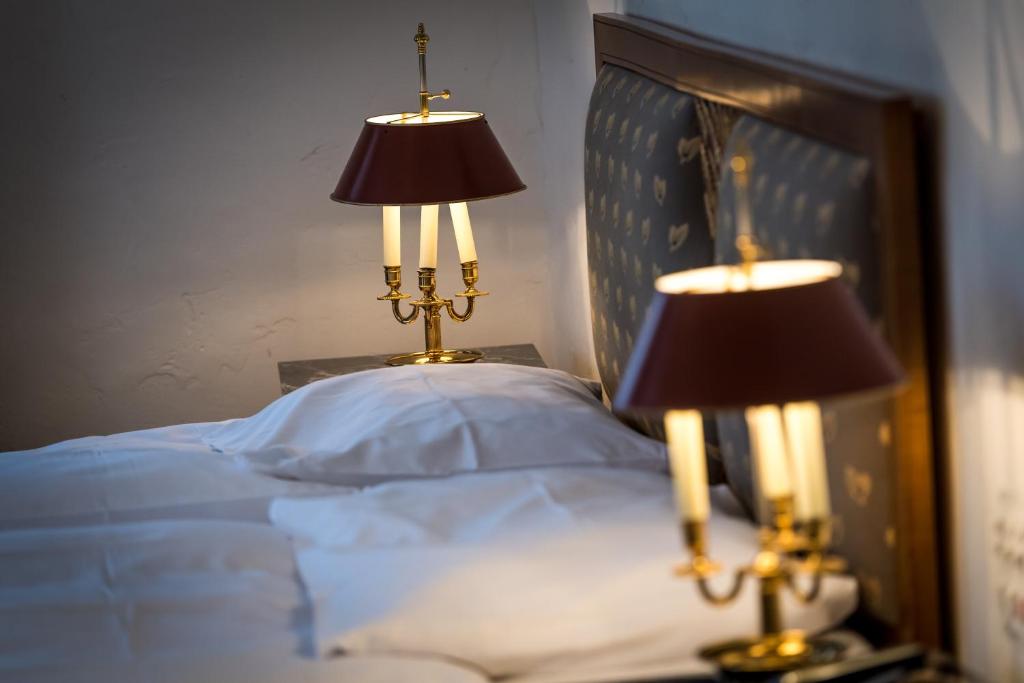 Postel nebo postele na pokoji v ubytování Auberge du Raisin