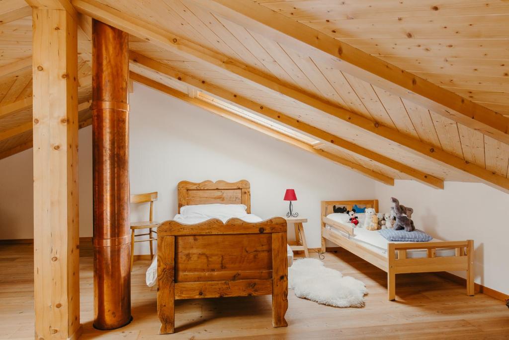 Postel nebo postele na pokoji v ubytování Baita Cavecia