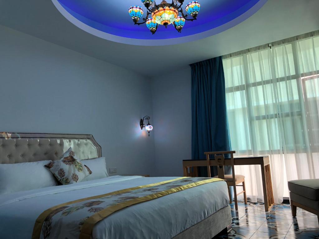Postel nebo postele na pokoji v ubytování Hotel Hilal