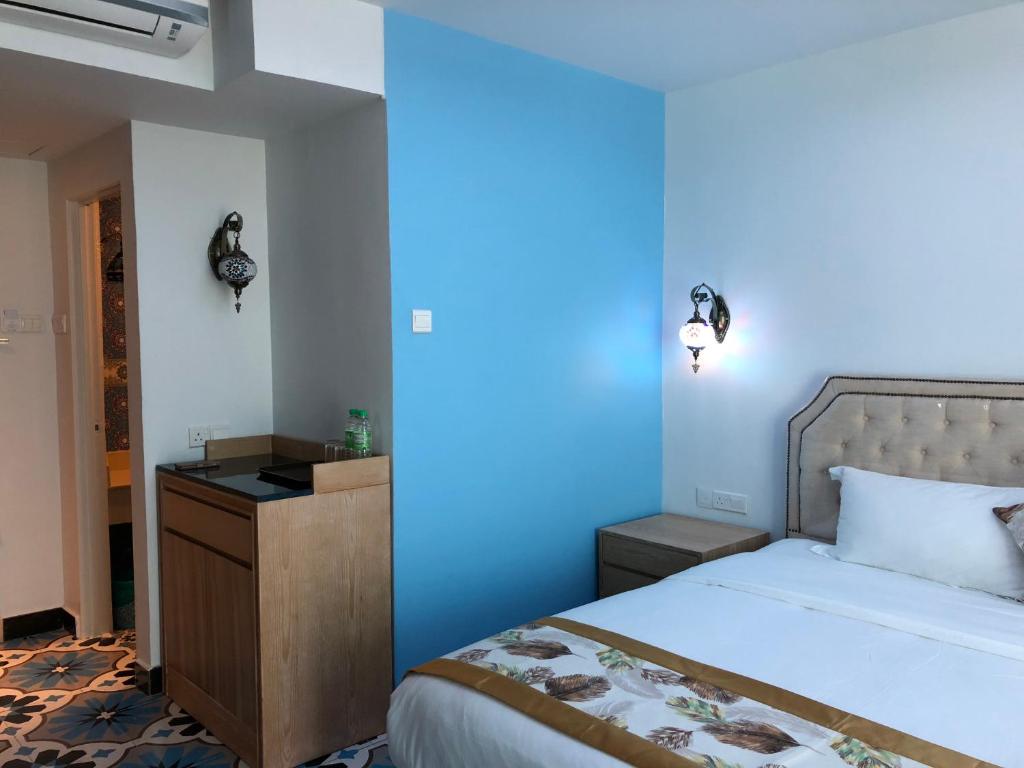 Postel nebo postele na pokoji v ubytování Hotel Hilal
