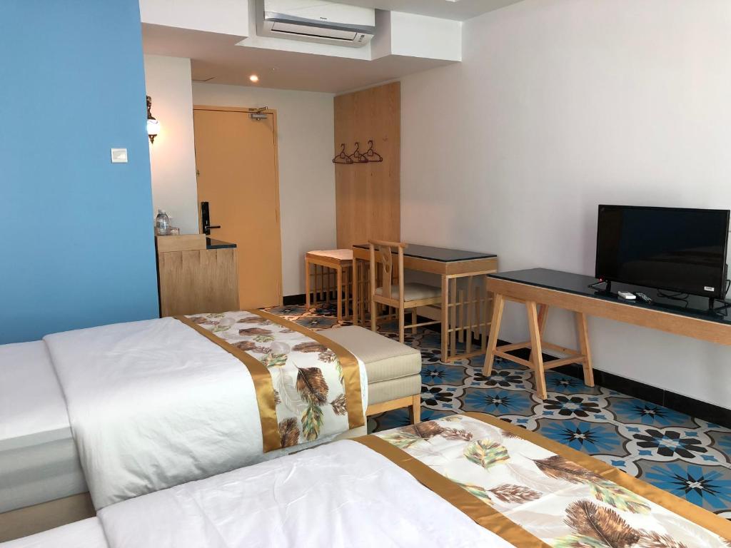 TV a/nebo společenská místnost v ubytování Hotel Hilal
