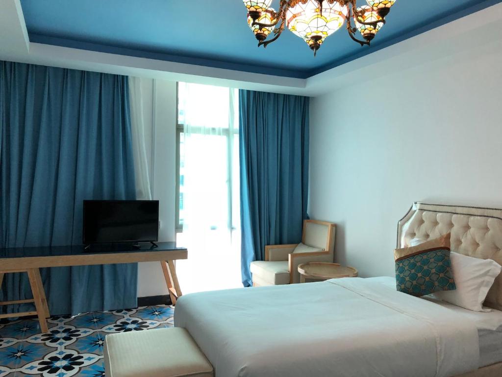 Postel nebo postele na pokoji v ubytování Hotel Hilal