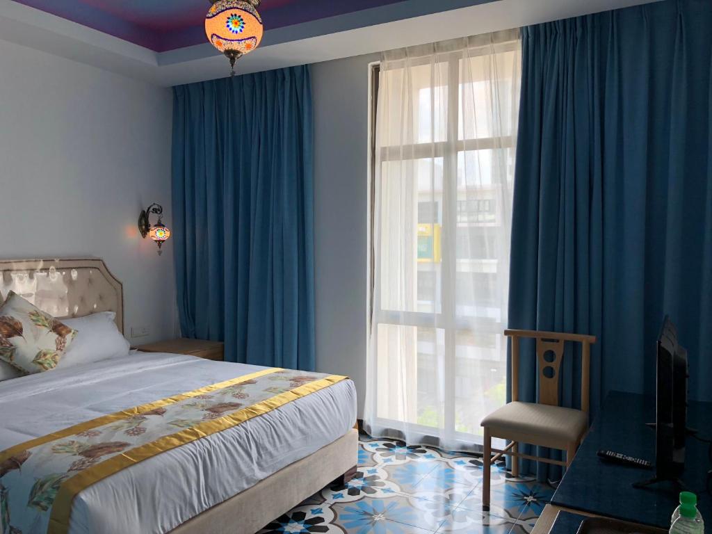 Postel nebo postele na pokoji v ubytování Hotel Hilal