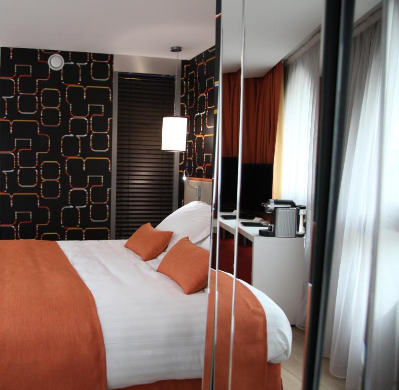 Postel nebo postele na pokoji v ubytování Best Western Premier Why Hotel