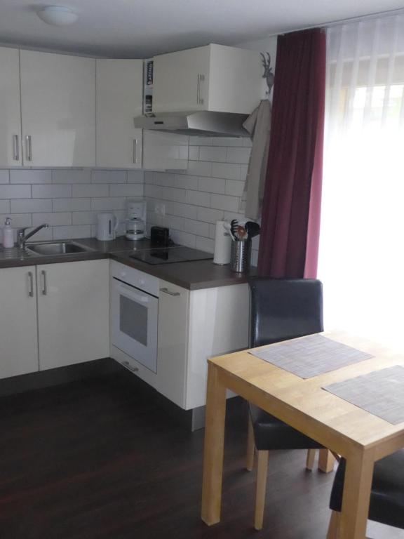 Kuchyň nebo kuchyňský kout v ubytování Apartment Dorfblick