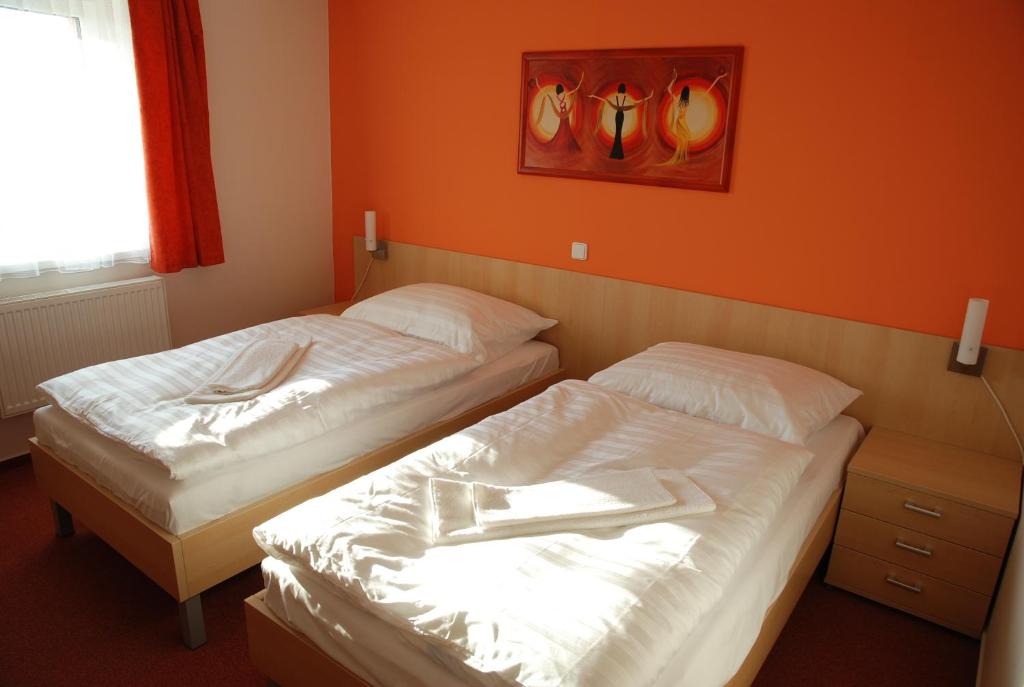 Postel nebo postele na pokoji v ubytování Hotel Senimo