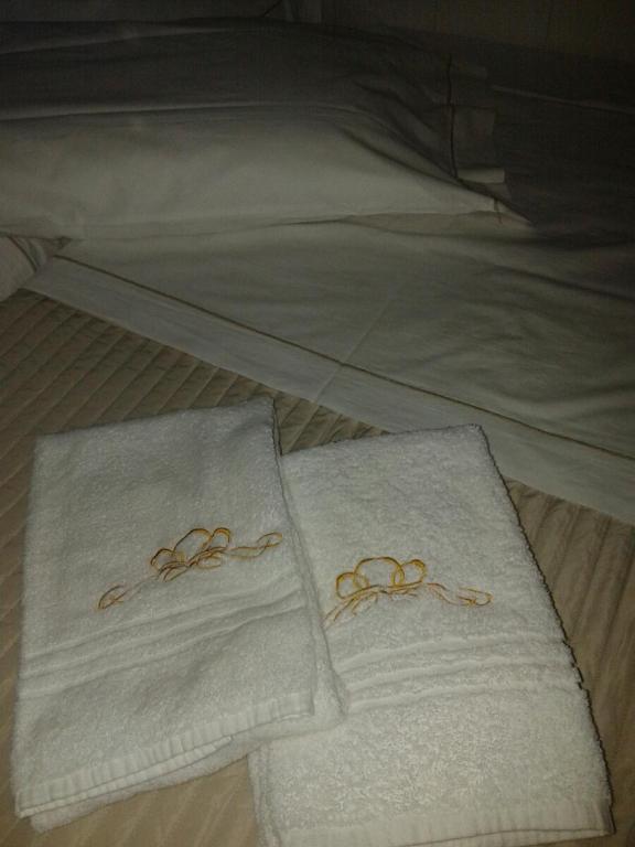 Postel nebo postele na pokoji v ubytování Hotel Malta