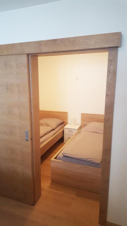 Postel nebo postele na pokoji v ubytování Appartement De Martin
