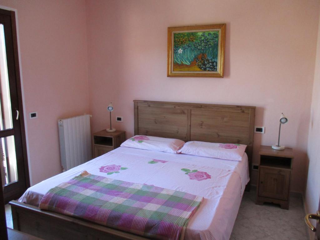 Postel nebo postele na pokoji v ubytování Il Boschetto