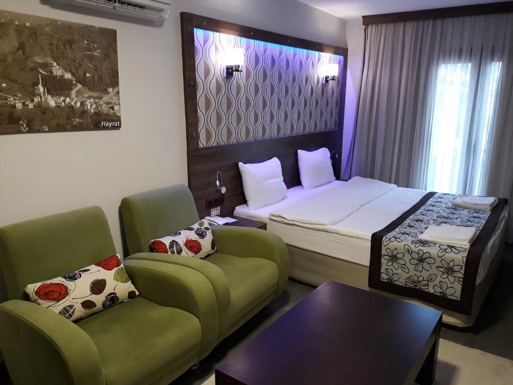 Postel nebo postele na pokoji v ubytování Dolphin Apart Hotel