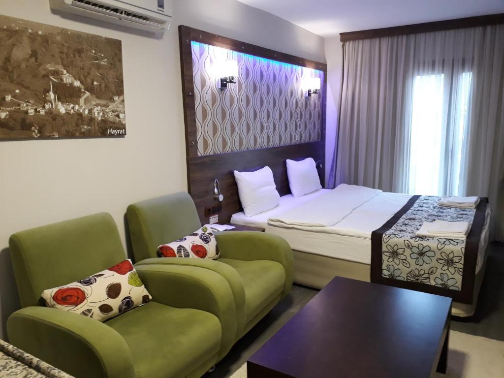 Postel nebo postele na pokoji v ubytování Dolphin Apart Hotel