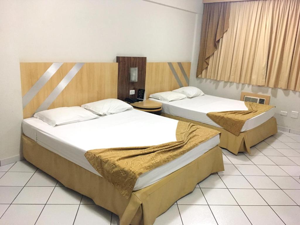 Postel nebo postele na pokoji v ubytování King Konfort Hotel