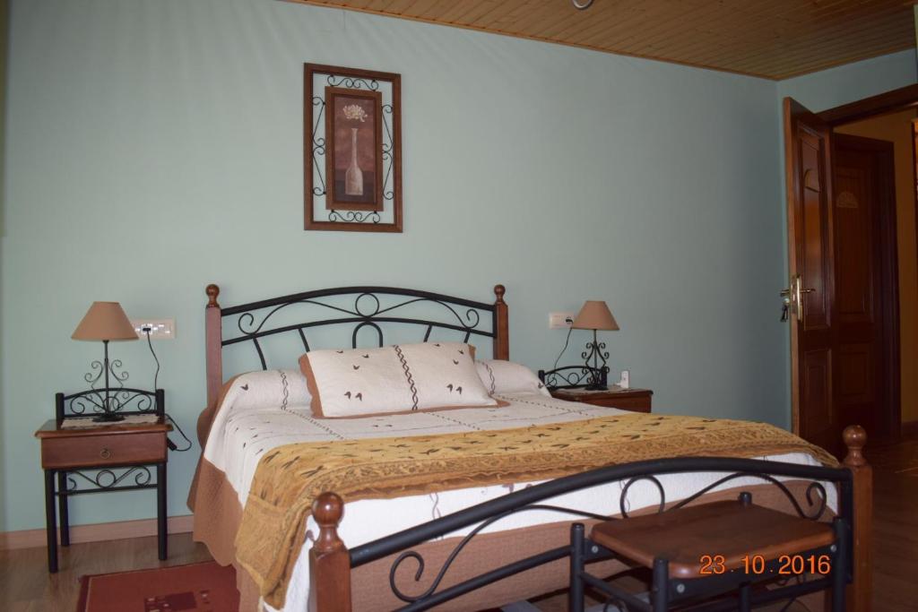 Posteľ alebo postele v izbe v ubytovaní Casa Rural Os Carballos