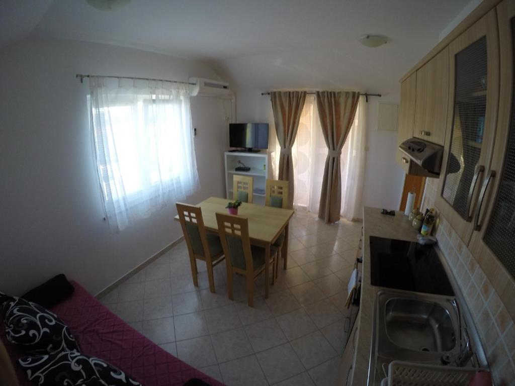 TV a/nebo společenská místnost v ubytování Apartment Laura