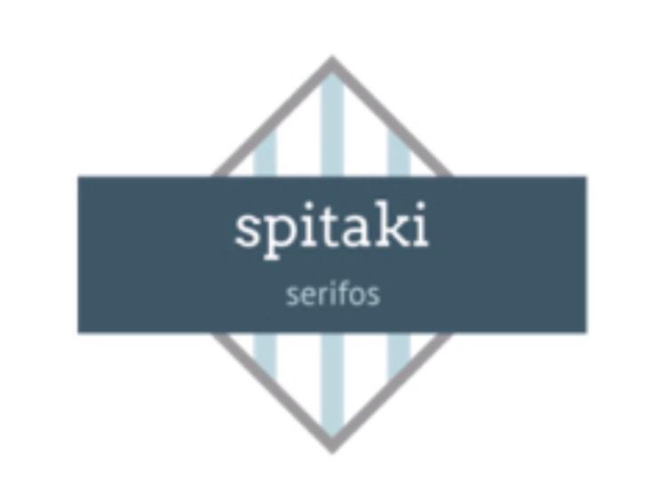 a blue sign with the words spark kit serifiers at Spitaki Serifos Studio in Rámos