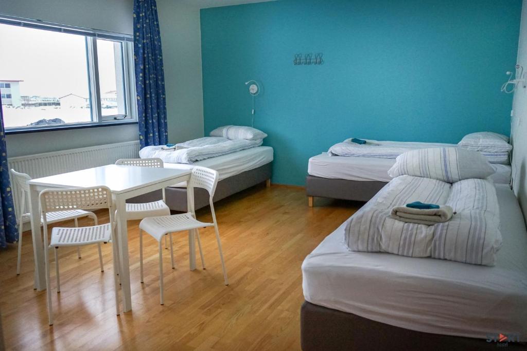Uma cama ou camas num quarto em Start Keflavík Airport