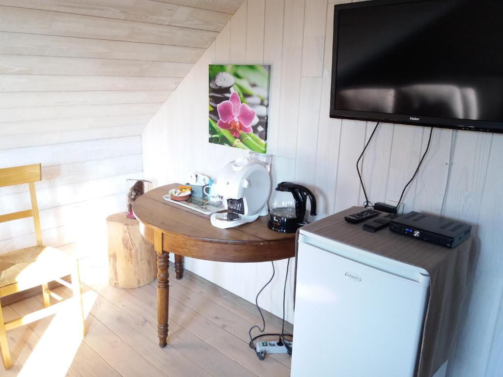 Kuchyň nebo kuchyňský kout v ubytování Auberge "La Fourchette Paysanne"