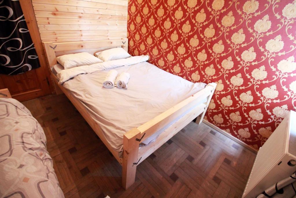Postel nebo postele na pokoji v ubytování Sheni Hostel