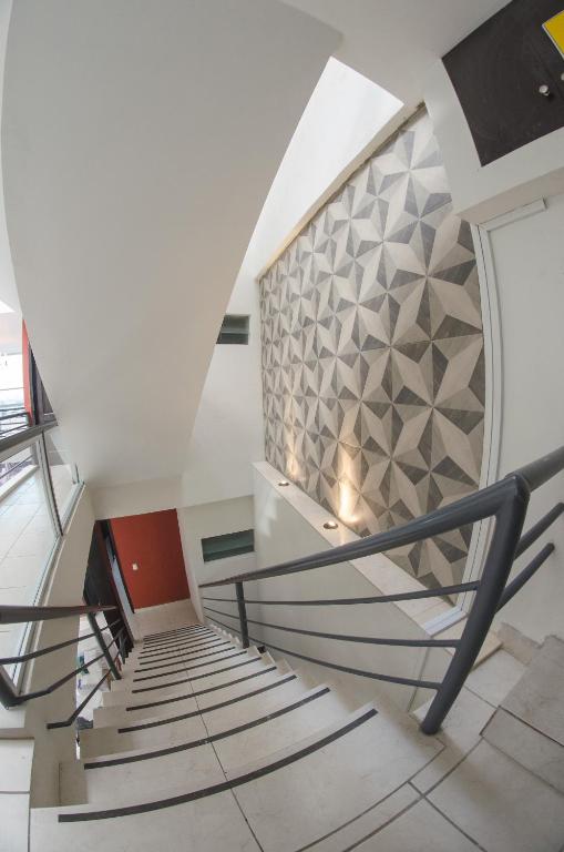 TV a/nebo společenská místnost v ubytování Hotel Belisario INN