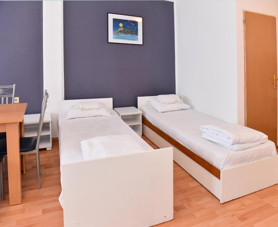 Postel nebo postele na pokoji v ubytování Hostel Milkaza