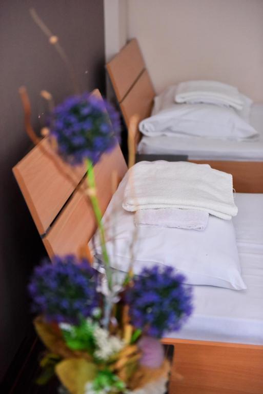 Postel nebo postele na pokoji v ubytování Hostel Milkaza