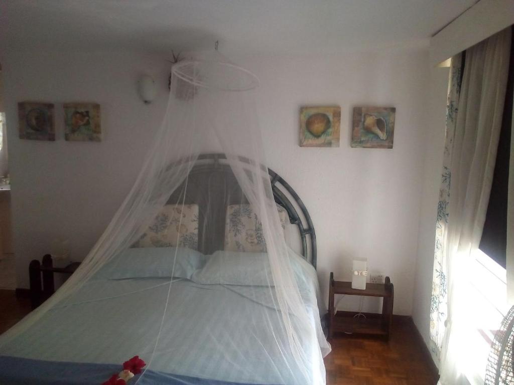 Postel nebo postele na pokoji v ubytování Maison Amantine