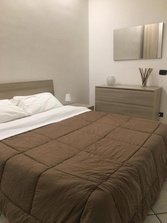 Кровать или кровати в номере Luxurious Street Apartments