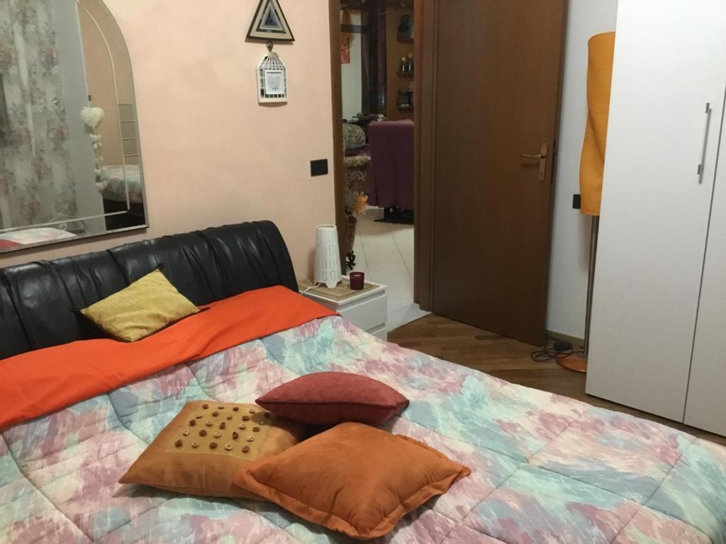 A bed or beds in a room at La Stellina
