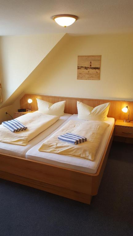 Postel nebo postele na pokoji v ubytování Hotel Schatthaus