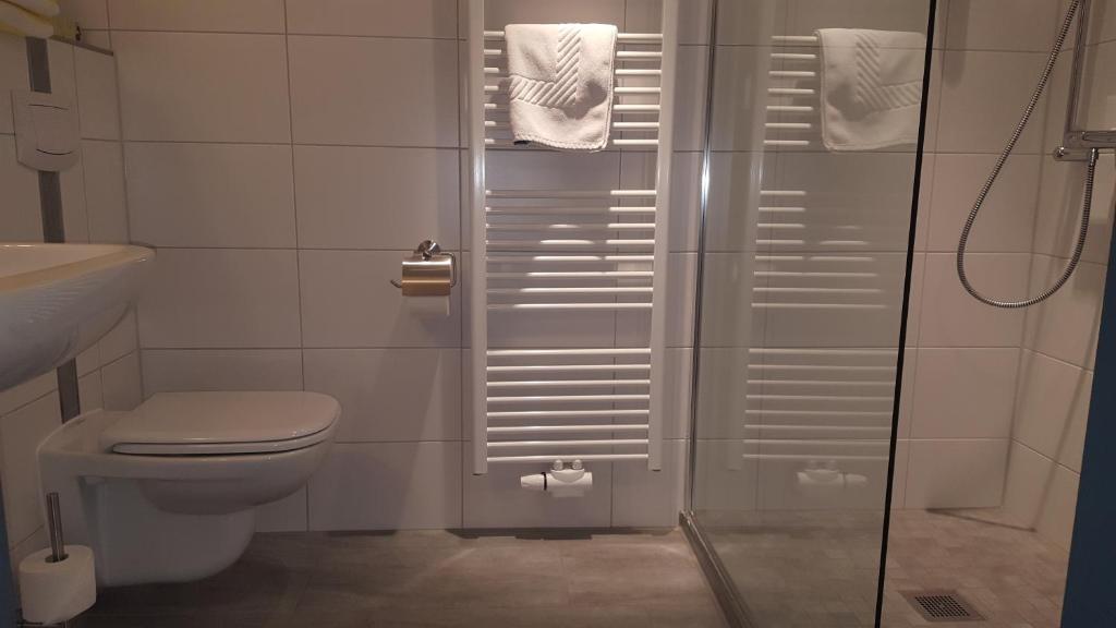 Koupelna v ubytování Hotel Schatthaus