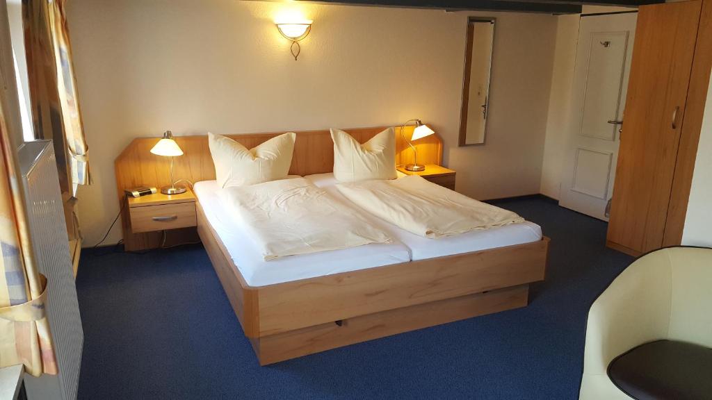 Postel nebo postele na pokoji v ubytování Hotel Schatthaus