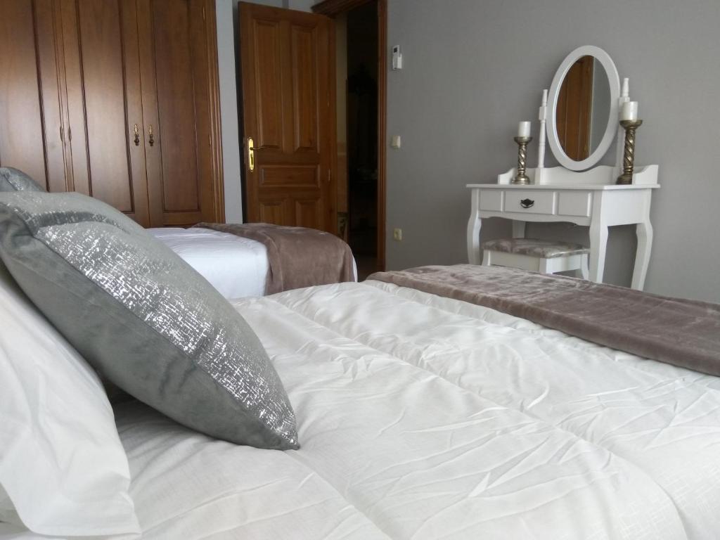 Postel nebo postele na pokoji v ubytování Casa Hormazas
