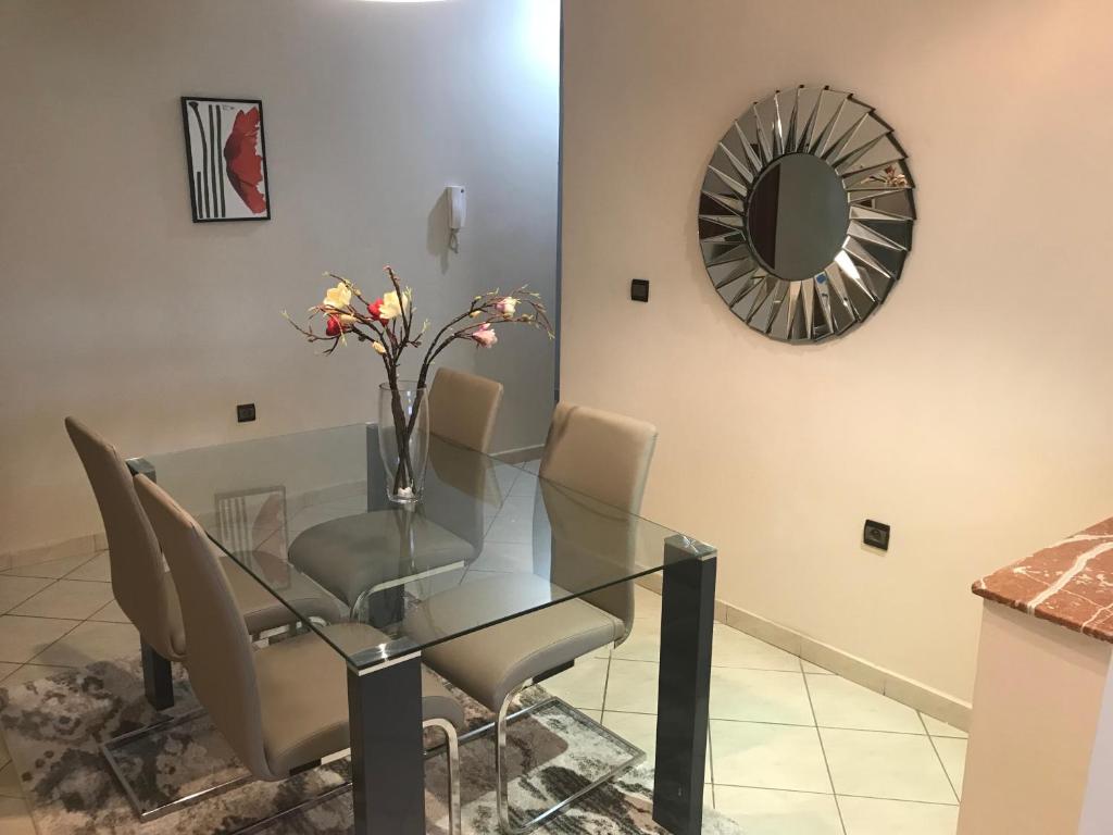 Χώρος καθιστικού στο Résidence les Ambassadeurs