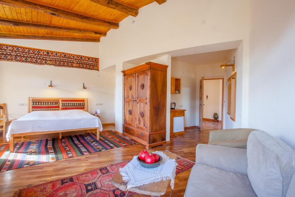 Postel nebo postele na pokoji v ubytování Hotel Mirhav