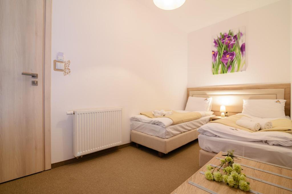 Villa Astra - Apartments & Restaurant - Deluxe Quadruple Room