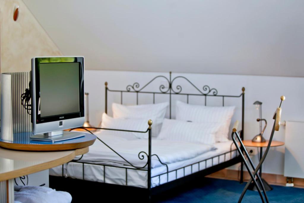 Postel nebo postele na pokoji v ubytování Hotel Watthalden