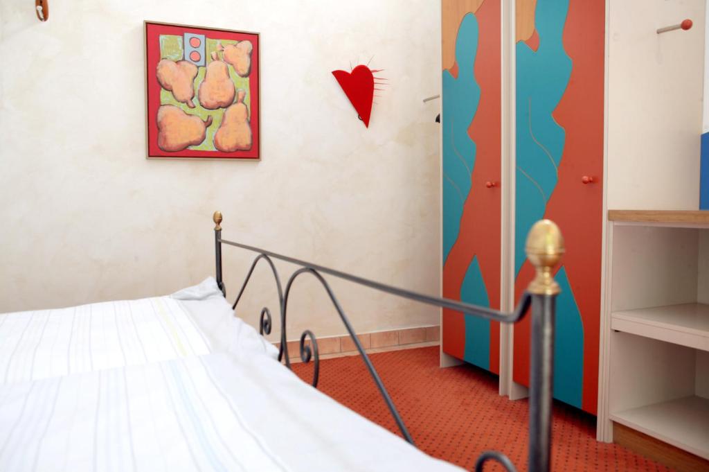 Postel nebo postele na pokoji v ubytování Hotel Watthalden