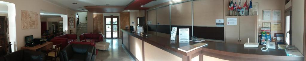 Kuchyň nebo kuchyňský kout v ubytování Zorbas Hotel