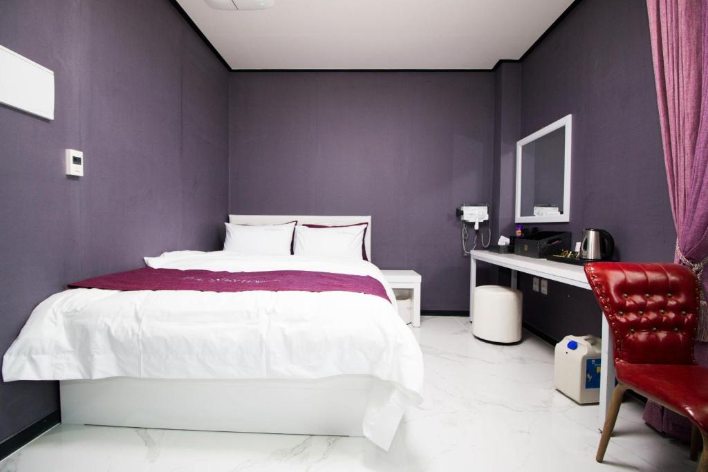 Postel nebo postele na pokoji v ubytování Yeosu Thestay Hostel
