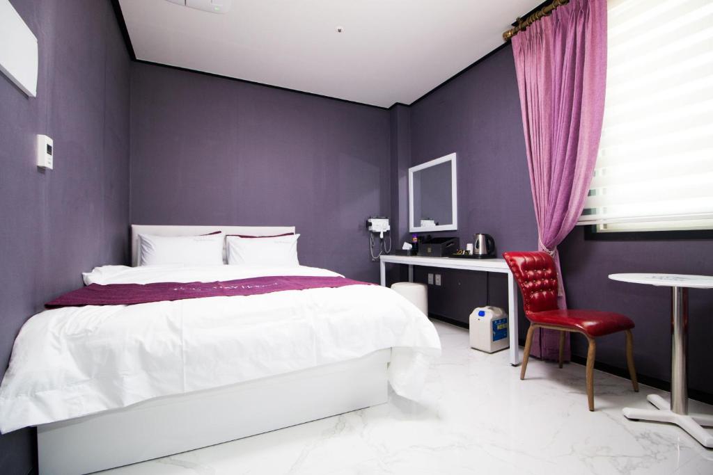 Postel nebo postele na pokoji v ubytování Yeosu Thestay Hostel