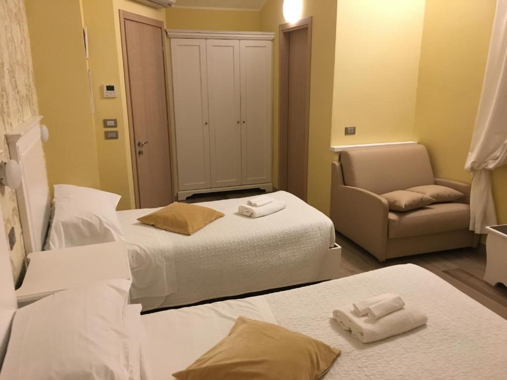 Postel nebo postele na pokoji v ubytování La Dimora di Francesco