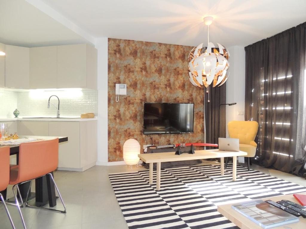 A television and/or entertainment centre at Casa Rincón Medanero