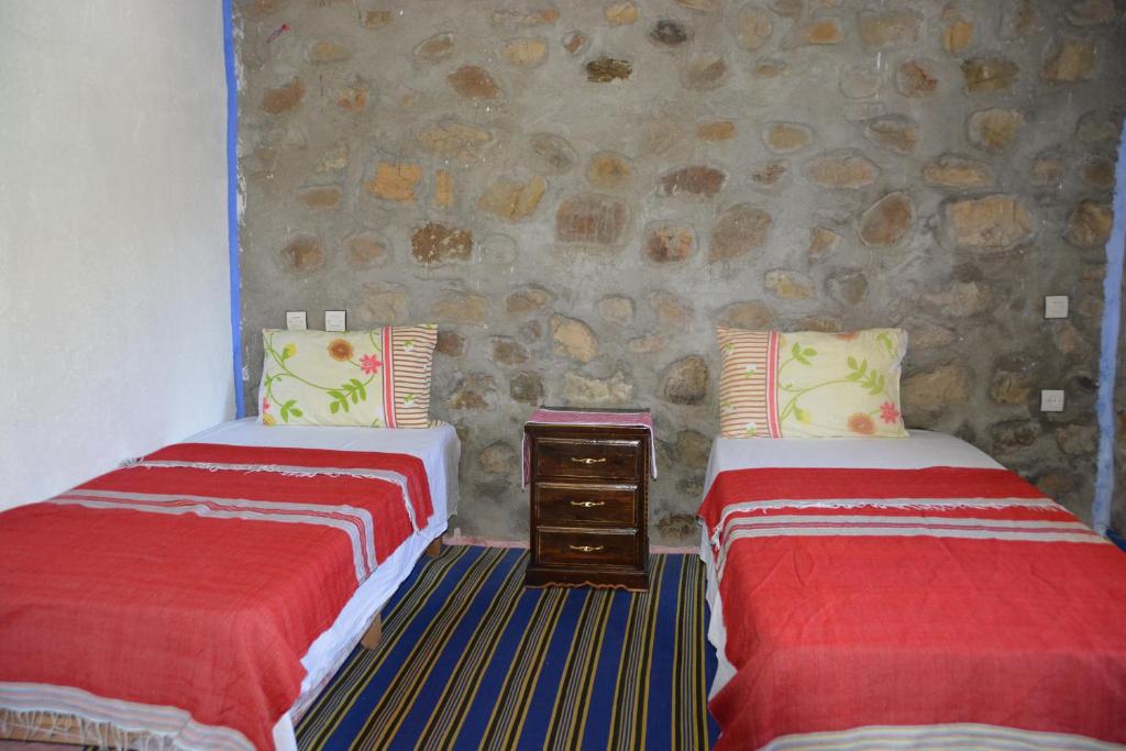 Postel nebo postele na pokoji v ubytování Gîte El houmar