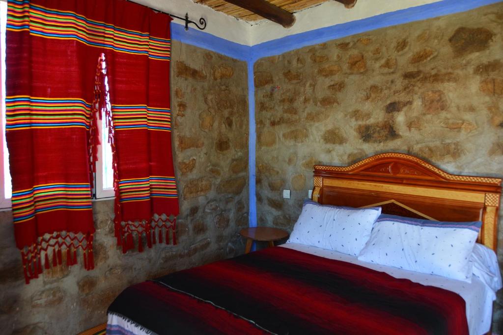 Postel nebo postele na pokoji v ubytování Gîte El houmar