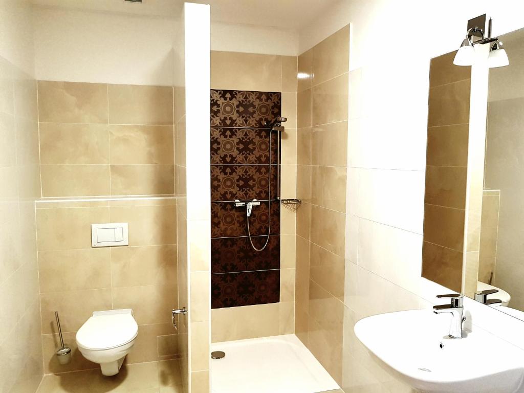 Koupelna v ubytování Hotel Dvůr