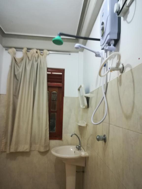 Koupelna v ubytování Hotel Sandara