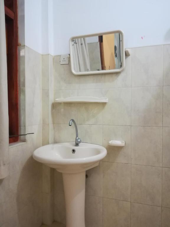 Koupelna v ubytování Hotel Sandara
