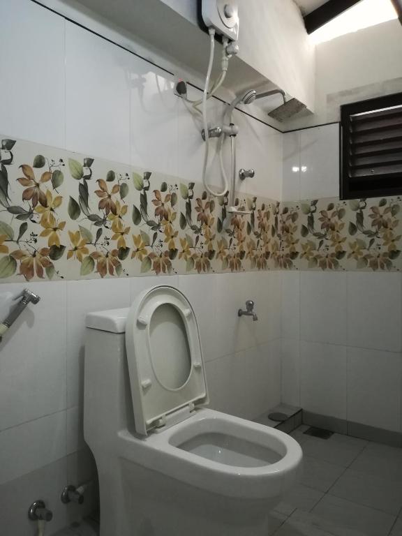 Koupelna v ubytování Hotel Sandara