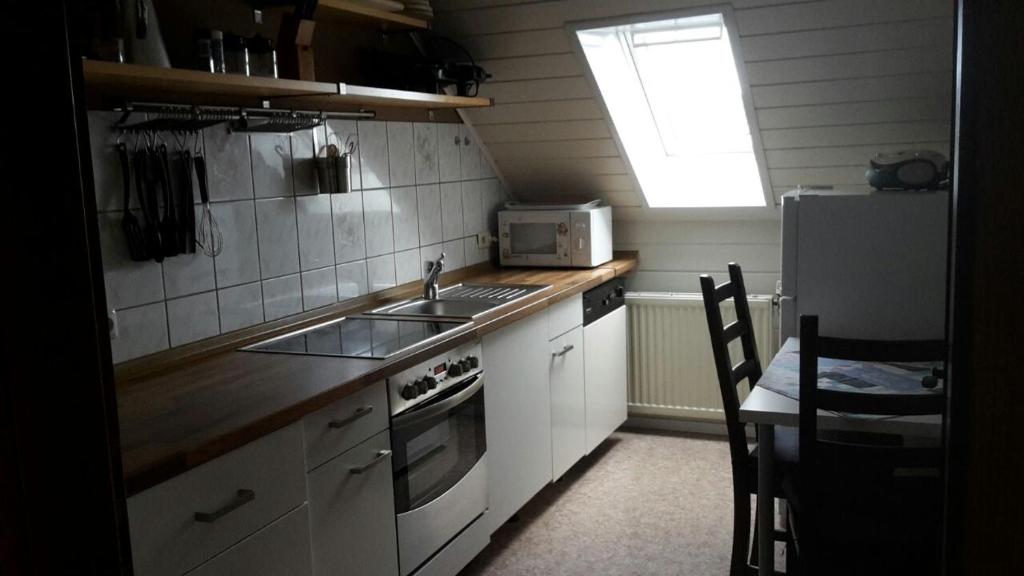 Kuchyň nebo kuchyňský kout v ubytování Zur schönen Aussicht